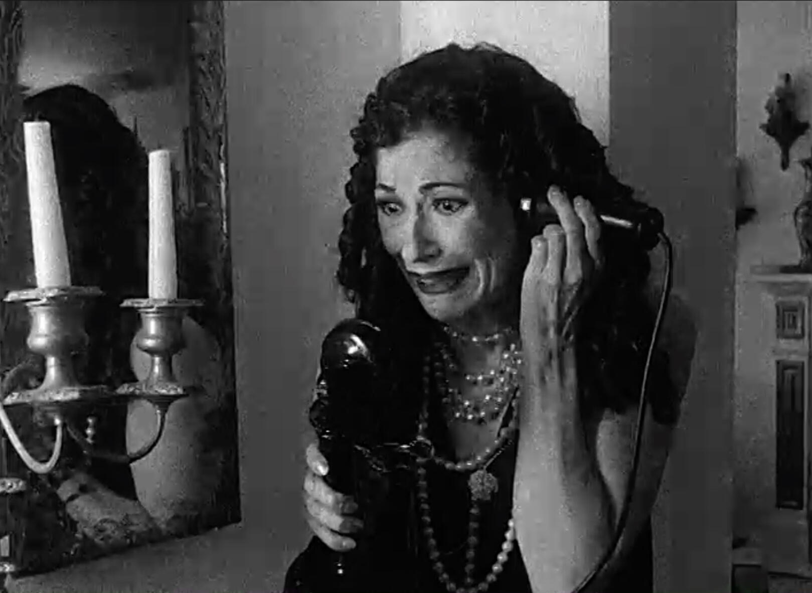 Black & White image of a woman on the telephone