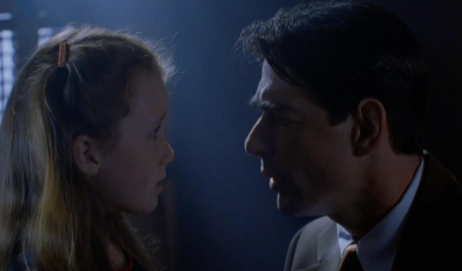 Man talking with young girl