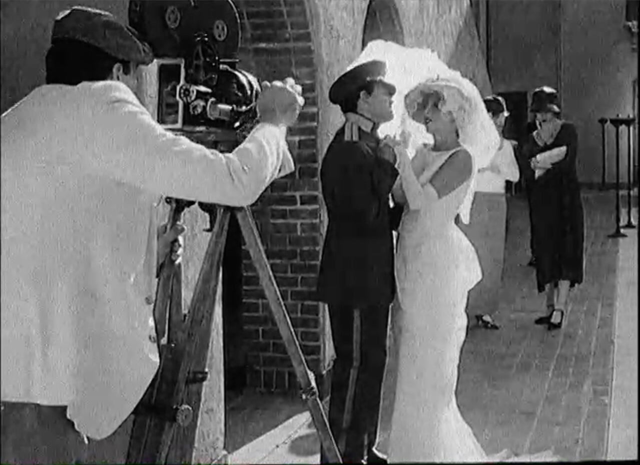 B&W silent movie handcrank cameraman